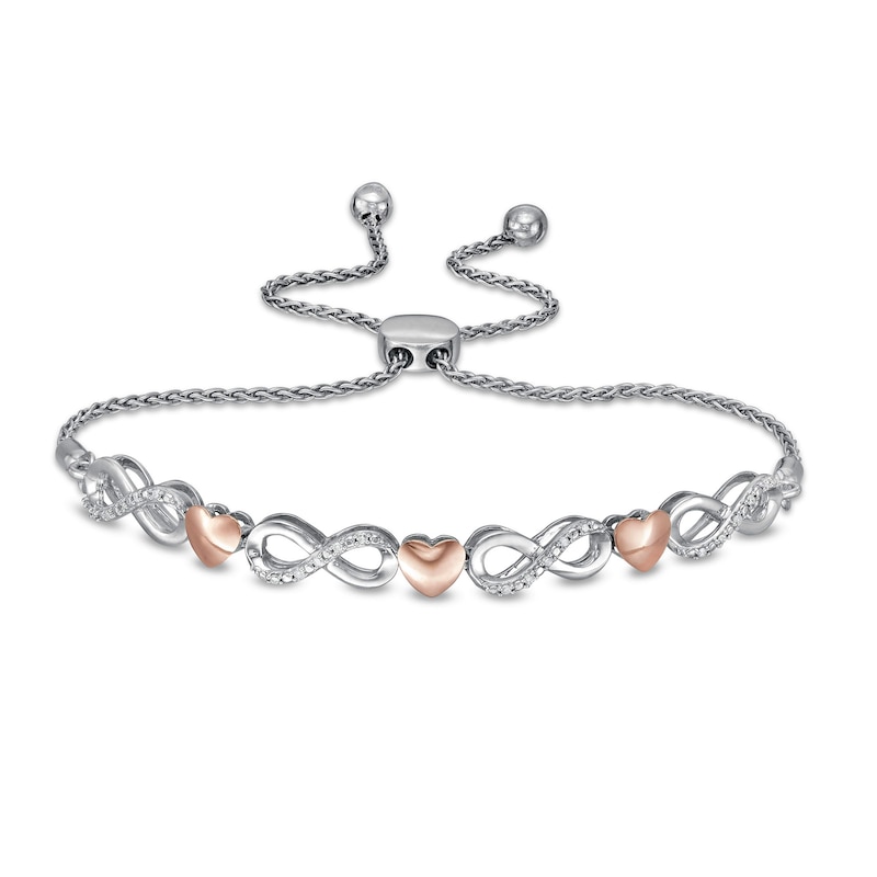 1/20 CT. T.W. Diamond Alternating Infinity Heart Bolo Bracelet in Sterling Silver and 10K Rose Gold - 9.5