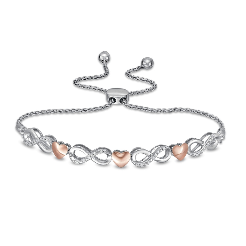 Main Image 1 of 1/20 CT. T.W. Diamond Alternating Infinity Heart Bolo Bracelet in Sterling Silver and 10K Rose Gold - 9.5