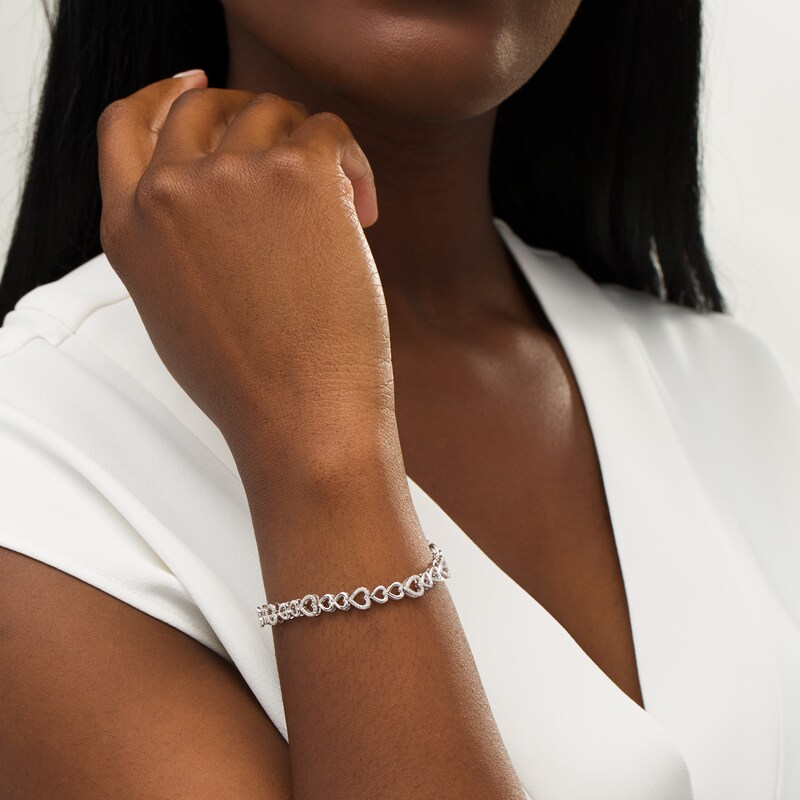 Main Image 2 of 1/15 CT. T.W. Diamond Alternating Sideways Hearts Bracelet in Sterling Silver - 7.5"