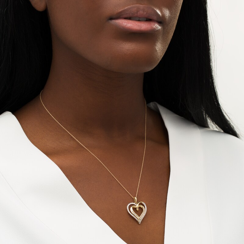 Main Image 2 of 1/2 CT. T.W. Baguette and Round Diamond Double Swirl Heart Pendant in 10K Gold