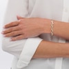Thumbnail Image 2 of 1/4 CT. T.W. Diamond Infinity Link Bracelet in 10K Gold