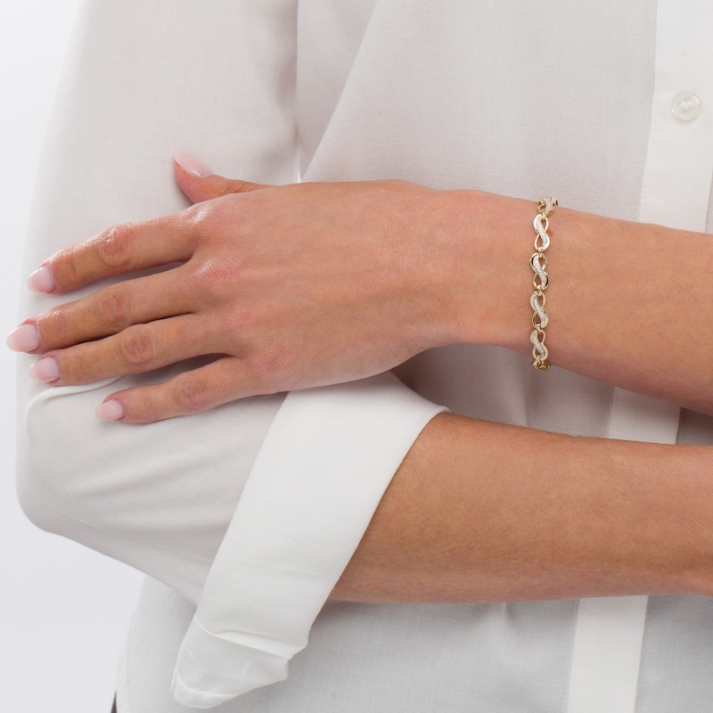 Main Image 2 of 1/4 CT. T.W. Diamond Infinity Link Bracelet in 10K Gold