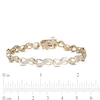 Thumbnail Image 4 of 1/4 CT. T.W. Diamond Infinity Link Bracelet in 10K Gold