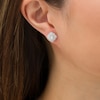 Thumbnail Image 1 of Marilyn Monroe™ Collection 5/8 CT. T.W. Oval Diamond Frame Starburst Stud Earrings in 10K White Gold