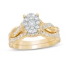 Thumbnail Image 0 of 3/4 CT. T.W. Oval Composite Diamond Frame Twist Shank Bridal Set in 10K Gold