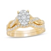 Thumbnail Image 1 of 3/4 CT. T.W. Oval Composite Diamond Frame Twist Shank Bridal Set in 10K Gold