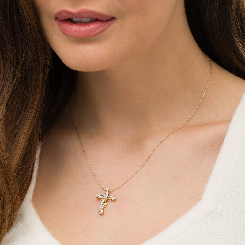 Main Image 2 of 1/3 CT. T.W. Diamond Swirl Cross Pendant in 10K Gold
