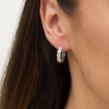 1/10 CT. T.W. Diamond Swirl Hoop Earrings in Sterling Silver