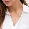 Thumbnail Image 1 of Wonder Woman™ Collection 1/8 CT. T.W. Diamond Symbol Necklace in 10K Gold