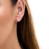 Thumbnail Image 1 of Wonder Woman™ Collection 1/8 CT. T.W. Diamond Symbol Stud Earrings in 10K Gold