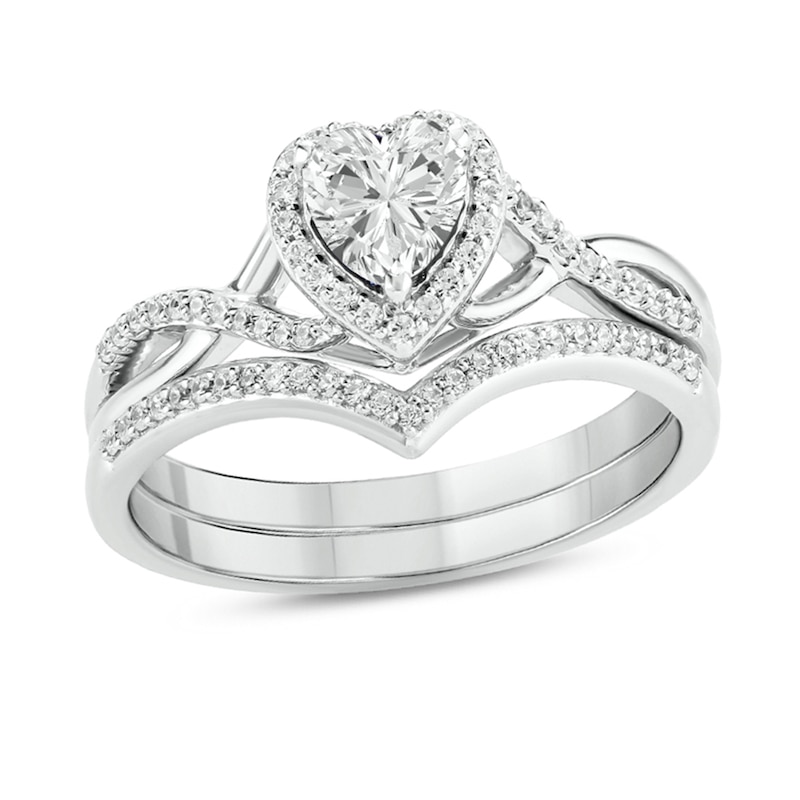 Main Image 1 of 5.0mm Heart-Shaped White Lab-Created Sapphire and 1/5 CT. T.W. Diamond Frame Twist Shank Bridal Set in Sterling Silver