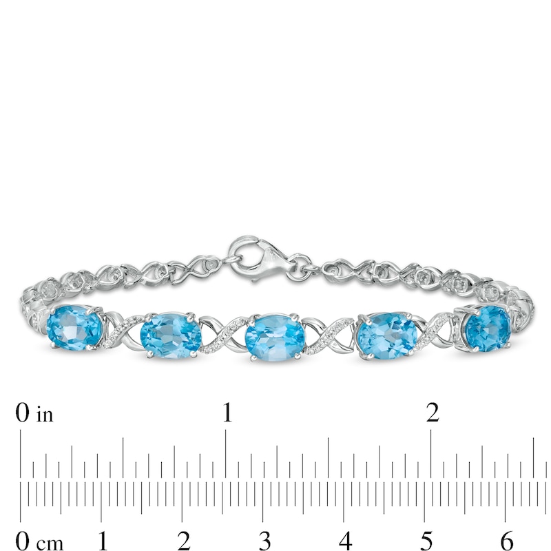 Main Image 4 of Oval Swiss Blue Topaz and Lab-Created White Sapphire Infinity Link Five Stone Bracelet in Sterling Silver - 7.5"