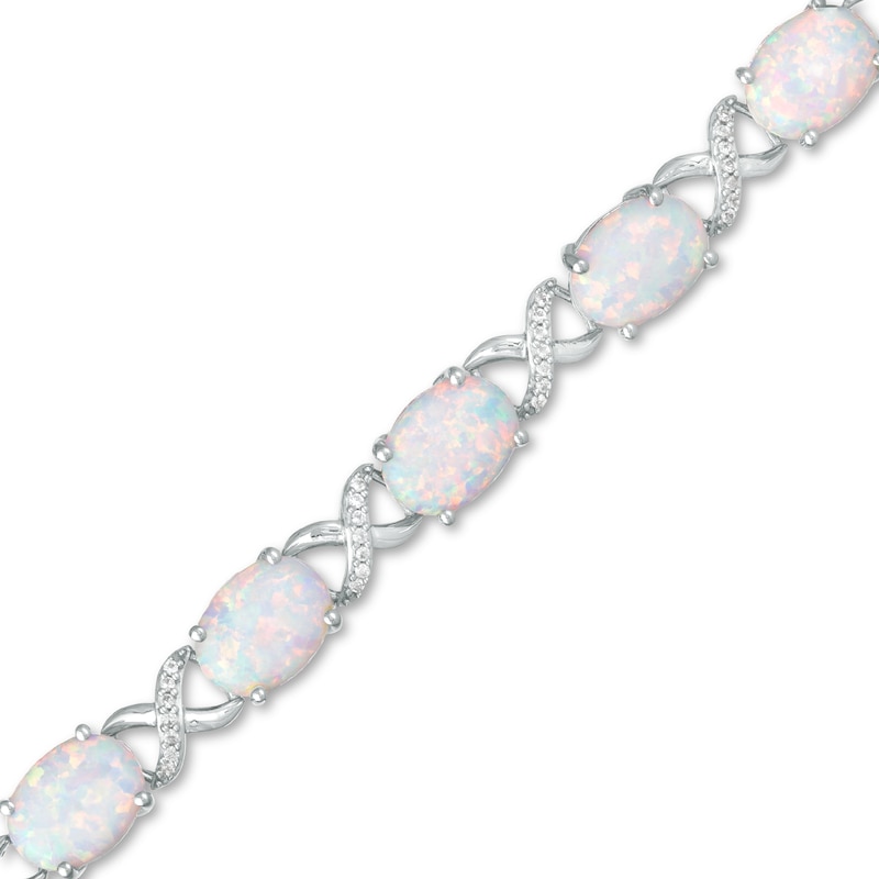 Main Image 1 of Oval Lab-Created Opal and White Sapphire Infinity Link Five Stone Bracelet in Sterling Silver - 7.5"