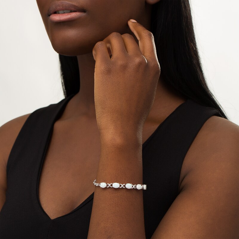 Main Image 2 of Oval Lab-Created Opal and White Sapphire Infinity Link Five Stone Bracelet in Sterling Silver - 7.5"