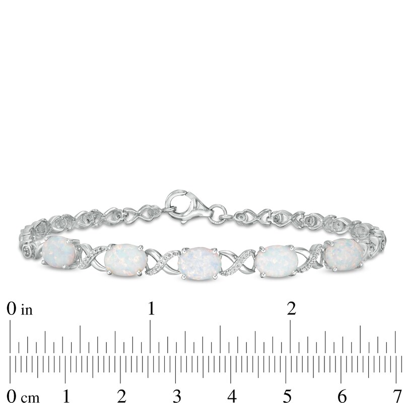 Main Image 4 of Oval Lab-Created Opal and White Sapphire Infinity Link Five Stone Bracelet in Sterling Silver - 7.5"