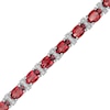 Thumbnail Image 0 of Oval Garnet and Diamond Accent Beaded Alternating Line Bracelet in Sterling Silver - 7.25"