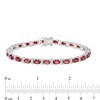 Thumbnail Image 4 of Oval Garnet and Diamond Accent Beaded Alternating Line Bracelet in Sterling Silver - 7.25"