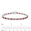 Thumbnail Image 3 of Oval Garnet and Diamond Accent Beaded Alternating Line Bracelet in Sterling Silver - 7.25"