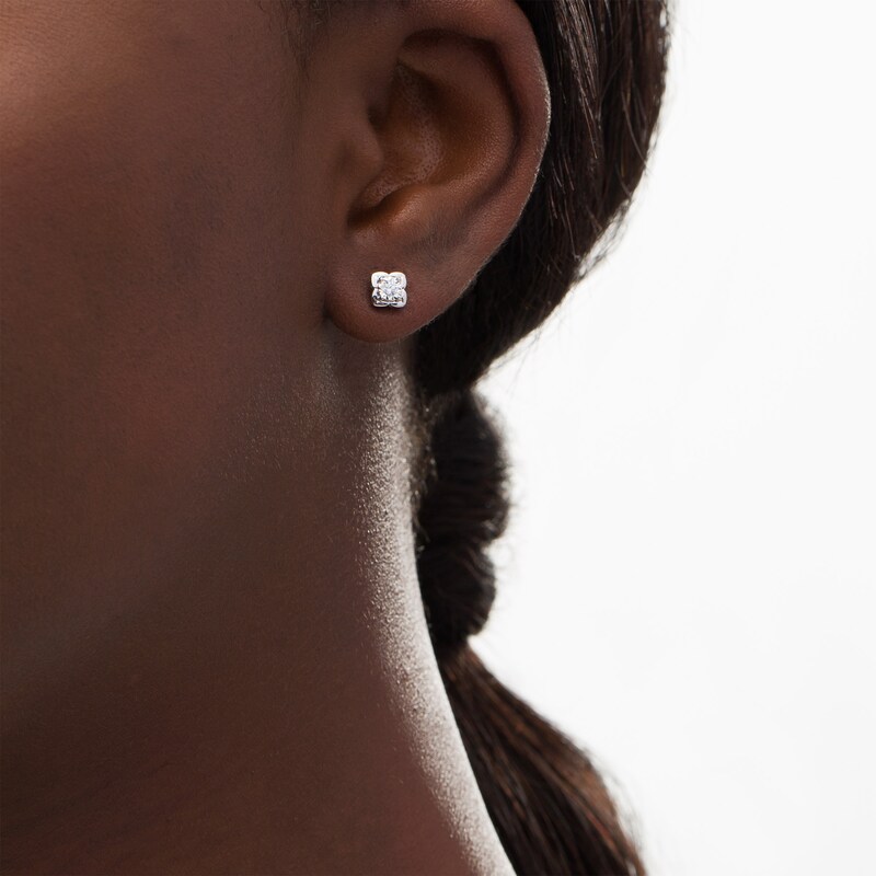 Main Image 2 of 1/15 CT. T.W. Diamond Solitaire Stud Earrings in Sterling Silver (J/I3)