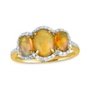 Thumbnail Image 1 of Oval Opal and 1/5 CT. T.W. Diamond Frame Three Stone Ring in 10K Gold
