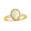 Thumbnail Image 1 of Oval Opal and 1/15 Ct. T.W. Diamond Frame Ring in 14K Gold