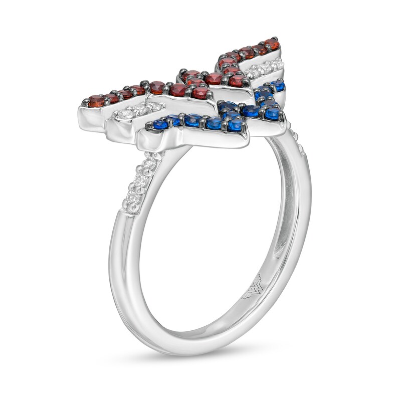 Wonder Woman™ Collection Garnet, Blue Sapphire and 1/15 CT. T.W. Diamond Symbol Ring in Sterling Silver