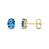 Thumbnail Image 0 of Oval Swiss Blue Topaz Solitaire Stud Earrings in 14K Gold
