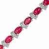 Thumbnail Image 0 of Oval Lab-Created Ruby and Diamond Accent Ribbon Alternating Line Bracelet in Sterling Silver - 7.25"