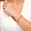 Thumbnail Image 1 of Oval Lab-Created Ruby and Diamond Accent Ribbon Alternating Line Bracelet in Sterling Silver - 7.25"