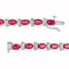 Thumbnail Image 2 of Oval Lab-Created Ruby and Diamond Accent Ribbon Alternating Line Bracelet in Sterling Silver - 7.25"
