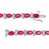 Thumbnail Image 3 of Oval Lab-Created Ruby and Diamond Accent Ribbon Alternating Line Bracelet in Sterling Silver - 7.25"