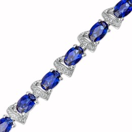 Oval Blue Lab-Created Sapphire and Diamond Accent Ribbon Alternating Line Bracelet in Sterling Silver - 7.25&quot;