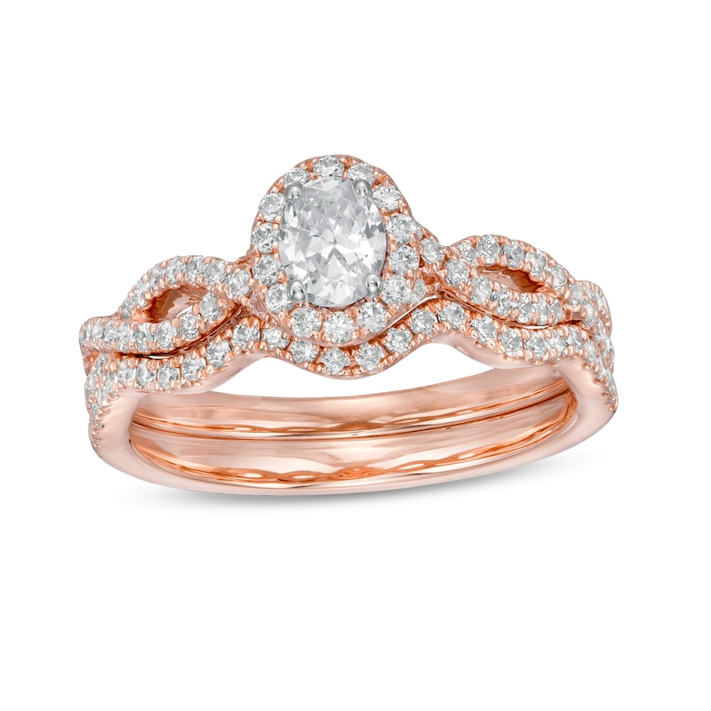 Main Image 1 of 1 CT. T.W. Oval Diamond Frame Split Shank Bridal Set in 14K Rose Gold (I/I2)