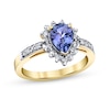 Pear-Shaped Tanzanite and 1/3 CT. T.W. Diamond Shadow Frame Ring in 14K Gold