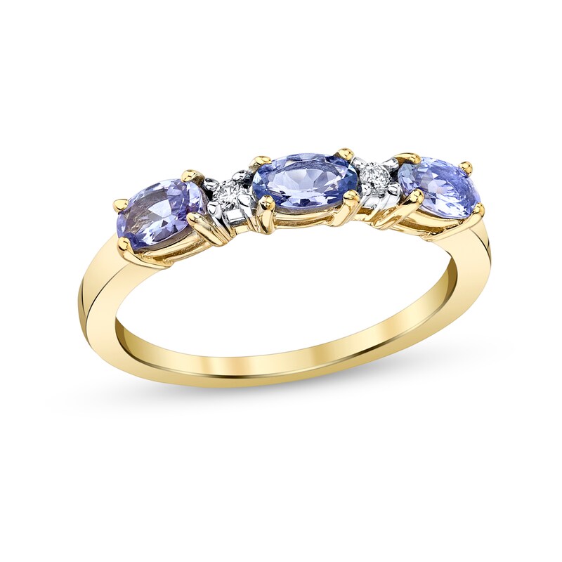 Sideways Oval Tanzanite and 1/20 CT. T.W. Diamond Three Stone Alternating Band in 14K Gold