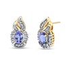 Thumbnail Image 0 of Oval Tanzanite and 1/3 CT. T.W. Baguette and Round Diamond Frame Flame-Top Stud Earrings in 14K Gold