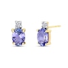 Oval Tanzanite and 1/10 CT. T.W. Diamond Accent Stud Earrings in 14K Gold