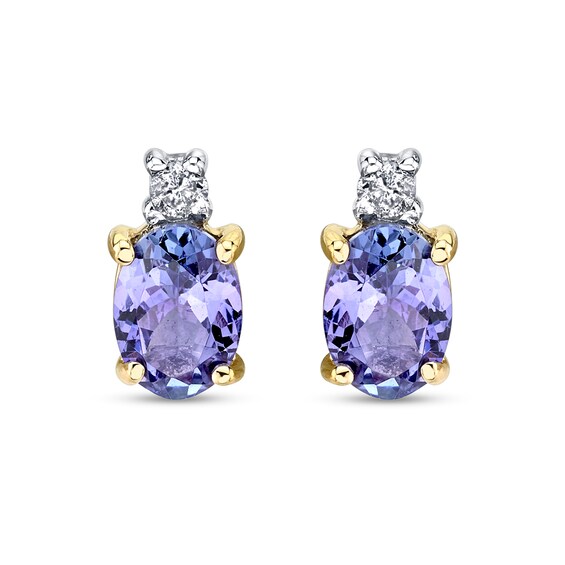 Oval Tanzanite and 1/10 CT. T.W. Diamond Accent Stud Earrings in 14K Gold Oval Tanzanite and 1/10 CT. T.W. Diamond Accent Stud Earrings in 14K Gold