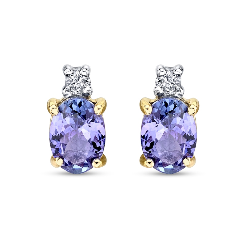 Oval Tanzanite and 1/10 CT. T.W. Diamond Accent Stud Earrings in 14K Gold