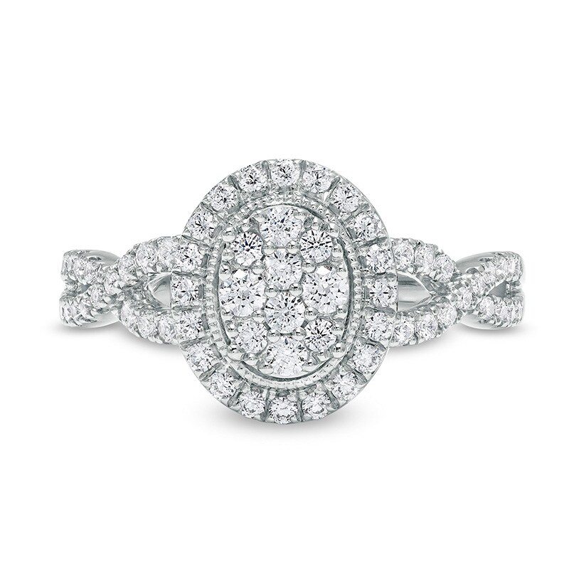 1/2 CT. T.W. Oval Multi-Diamond Frame Twist Shank Vintage-Style Engagement  Ring in 10K White Gold