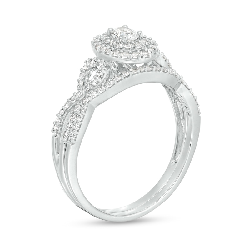 Main Image 3 of 5/8 CT. T.W. Oval Diamond Double Frame Twist Shank Bridal Set in 10K White Gold