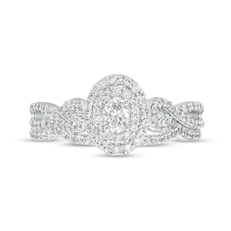Main Image 4 of 5/8 CT. T.W. Oval Diamond Double Frame Twist Shank Bridal Set in 10K White Gold
