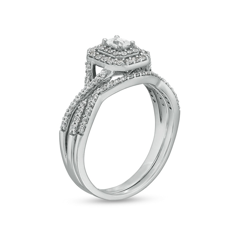 5/8 CT. T.W. Emerald-Cut Diamond Frame Bridal Set in 10K White Gold (I/I1)