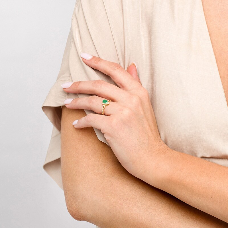 Main Image 2 of Pear-Shaped Emerald and 1/6 CT. T.W. Diamond Frame Twist Shank Ring in 10K Gold