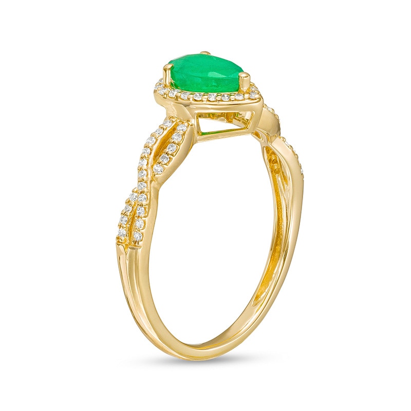Pear-Shaped Emerald and 1/6 CT. T.W. Diamond Frame Twist Shank Ring in 10K Gold