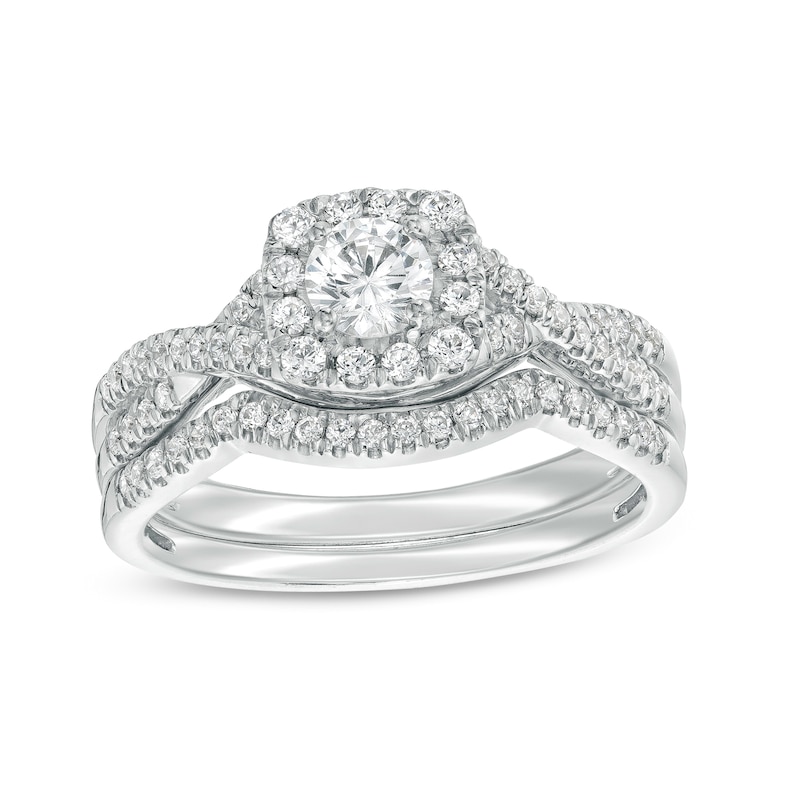 Main Image 1 of 3/4 CT. T.W. Certified Diamond Cushion-Shaped Frame Twist Shank Bridal Set in 14K White Gold (I/I2)