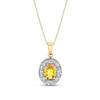 Thumbnail Image 0 of Oval Yellow Sapphire and 1/5 CT. T.W. Diamond Frame Drop Pendant in 14K Gold