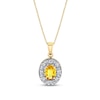 Thumbnail Image 1 of Oval Yellow Sapphire and 1/5 CT. T.W. Diamond Frame Drop Pendant in 14K Gold