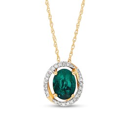 Oval Emerald and 1/8 CT. T.W. Diamond Open Swirl Frame Pendant in 10K Gold