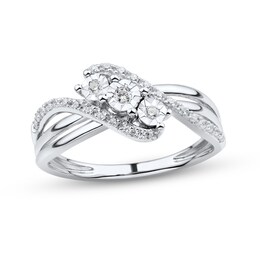 1/6 CT. T.W. Diamond Three Stone Bypass Twist Shank Engagement Ring in 10K White Gold